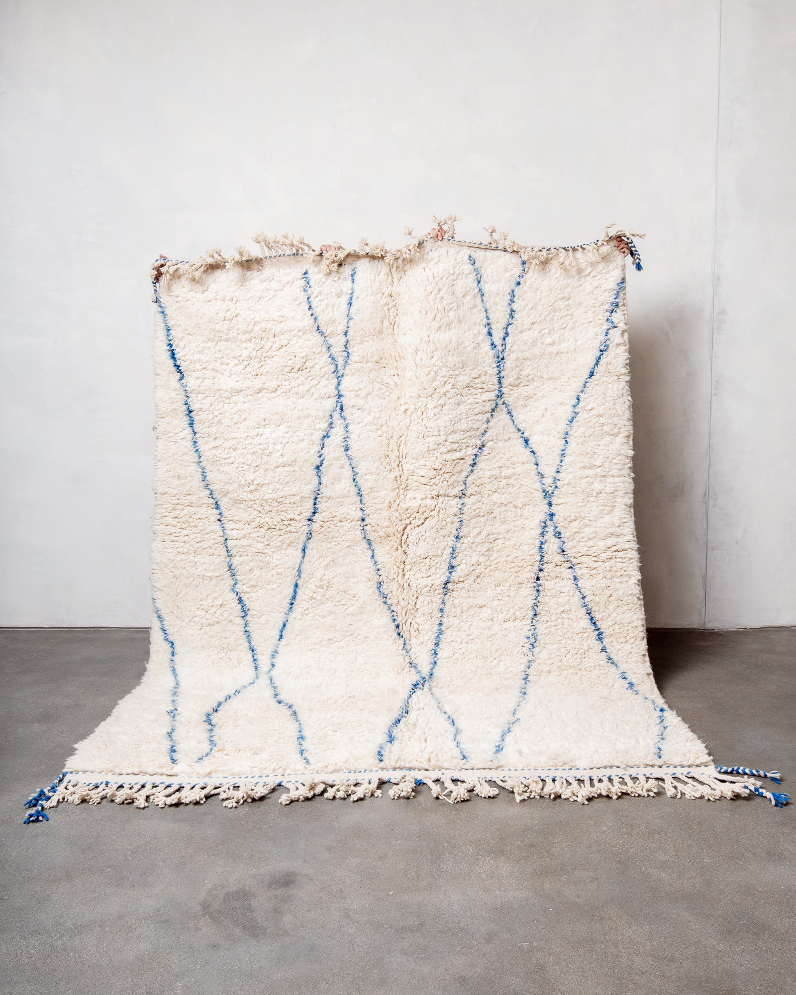 Modern, designer, handcrafted Berber rug from Morocco. Beniourain carpet with beautiful colours and patterns and fluffy wool texture.
